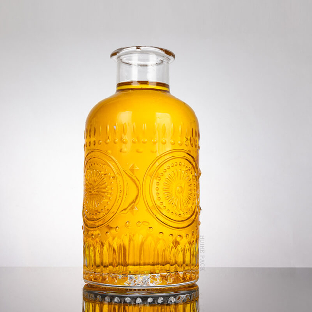 Elaborate Floral - Inspired Glass Liquor Bottle with Thick Neck