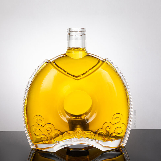 Garrafa de licor plana oval com padr&atilde;o de corrente ao redor