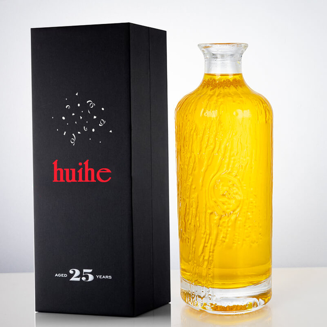 700ml Cylinder Embossed Pattern of Water-﻿Flow Glass Liquor Bottle