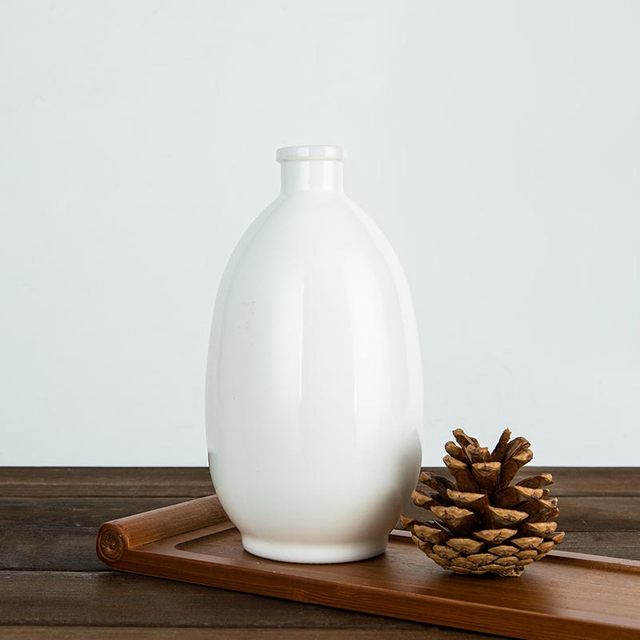 Okrągła butelka na alkohol z opalowego szkła o pojemności 50CL