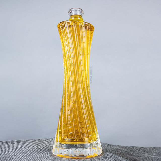 Garrafa de vidro transparente de cintura oval torcida 500ml atacado