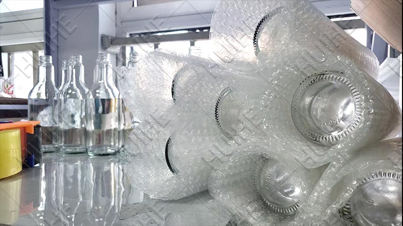 How to Pack Glass Bottles in Luggage - packing with bubble wrap