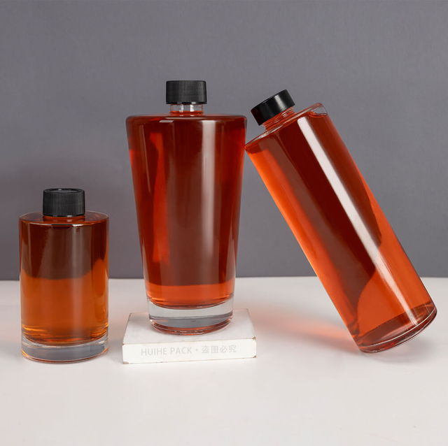 Short Screw Neck Flat Shoulder Round Glass Alcohol Bottles