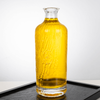 700ml Cylinder Embossed Pattern of Water-﻿Flow Glass Liquor Bottle