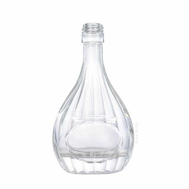 Pear - Shaped Glass Liquor Bottle with Vertical Ribbed Patterns
