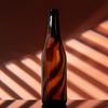 Hot Sale 350ml Amber Empty Glass Beer Bottle with Crown Cap