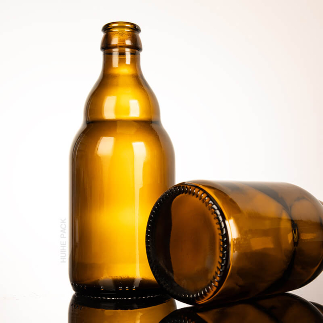 Διαθέσιμο Κεχριμπάρι άδειο γυάλινο μπουκάλι μπύρας με καπάκι κορώνας