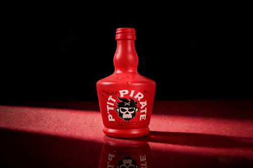 red glass spirits bottle