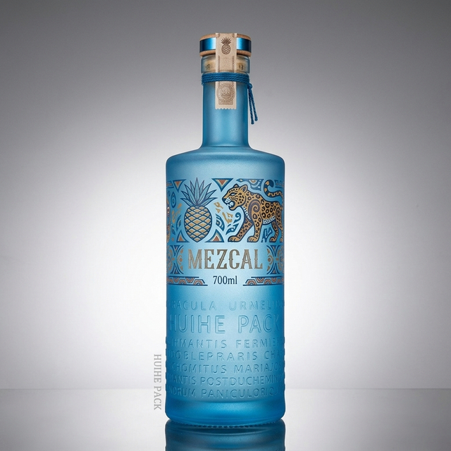 Raised Letters Textured Cylinder Glass Liquor Bottle