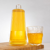 Tapered Wide Bottom Vertical Ribbed Glass Liquor Bottle