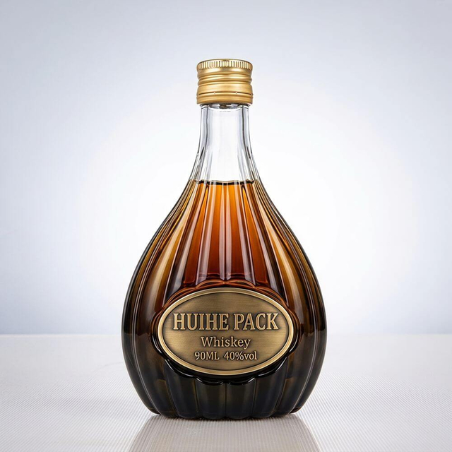Pear - Shaped Glass Liquor Bottle with Vertical Ribbed Patterns