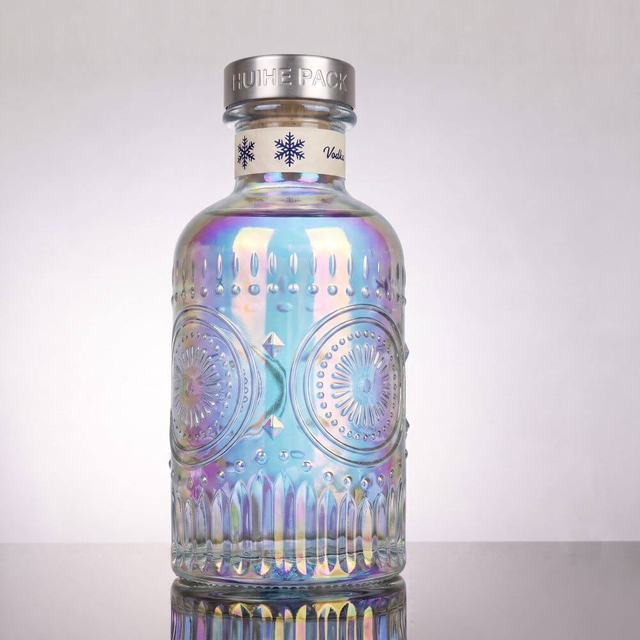 Elaborate Floral - Inspired Glass Liquor Bottle with Thick Neck