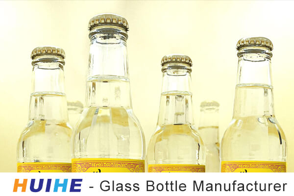 water glass bottle with crown cap
