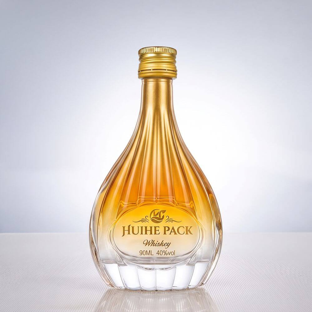 Pear - Shaped Glass Liquor Bottle with Vertical Ribbed Patterns